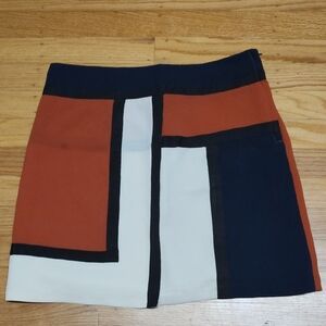 Chic Geometric Mini Skirt in Navy and Rust